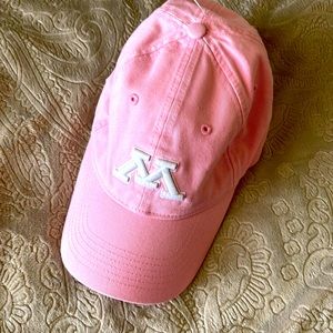 Pink ball cap with the “M” letter. New never worn! Hanging tag still on! Grab!!